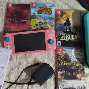 Nintendo switch lite coral 120gb with games and accessories